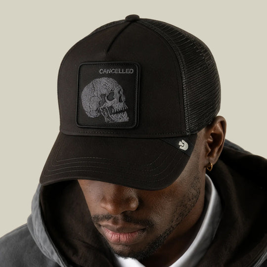 Goorin Bros Tonal Skull trucker hat in Void, on model