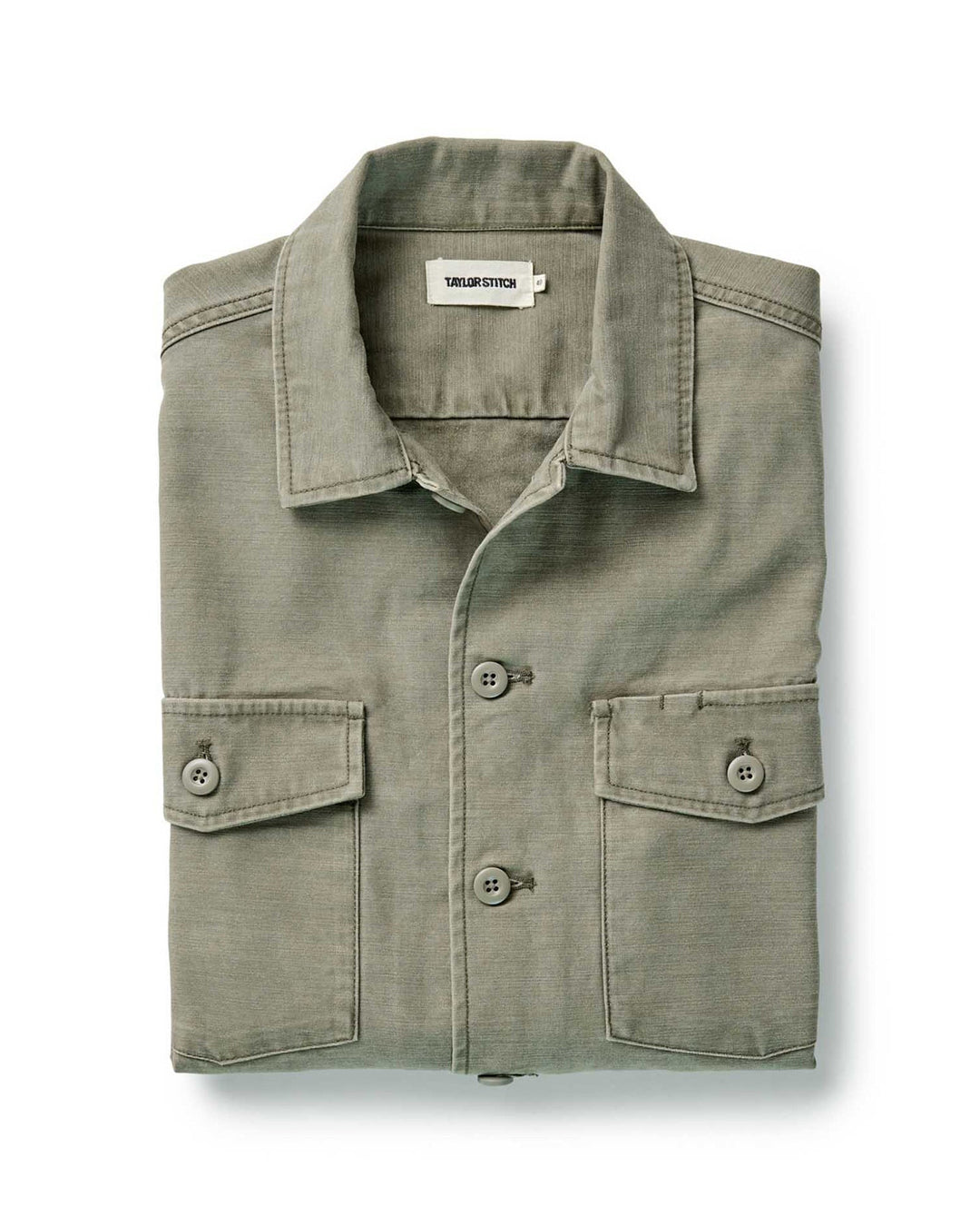 Taylor Stitch The Surplus Shirt in Field Olive Reverse Sateen, folded flat lay