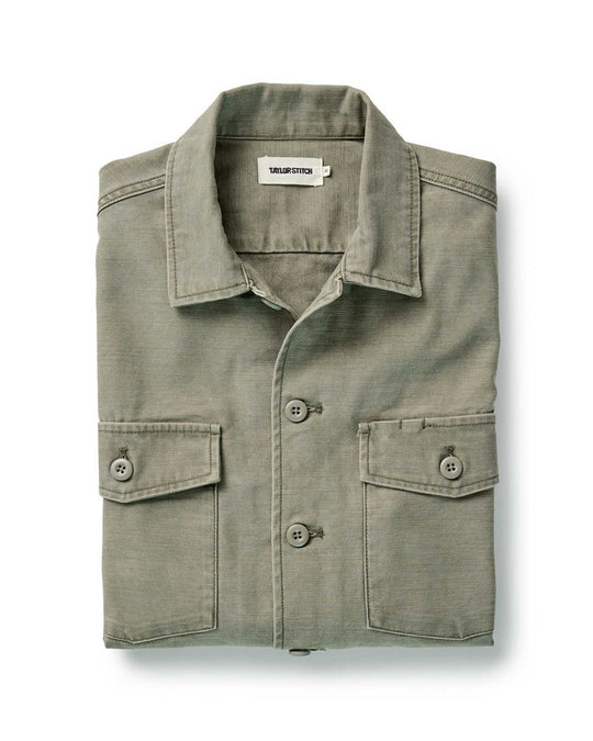 Taylor Stitch The Surplus Shirt in Field Olive Reverse Sateen, folded flat lay