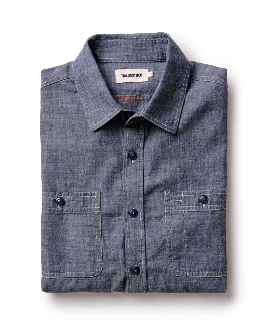 Taylor Stitch The Foundry Shirt in Rinsed Indigo Chambray, folded flat lay