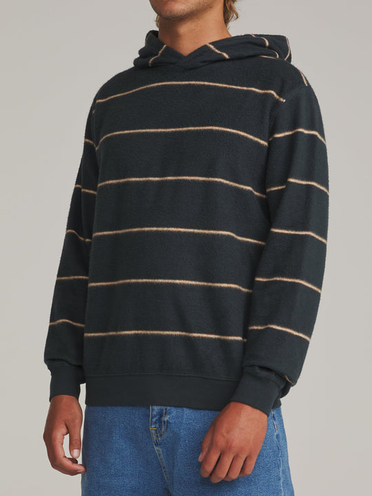 Katin Parks Hood in Black Wash, worn by a model, side view