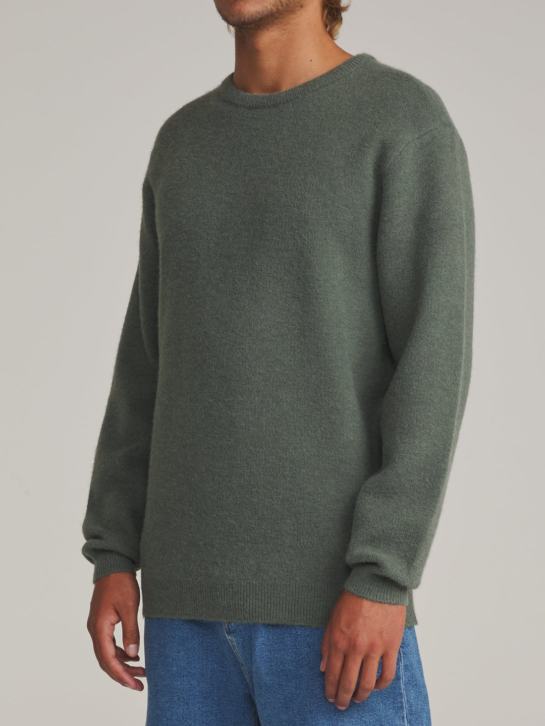 Katin Rivers Sweater in Gray Green, worn by a model, side view