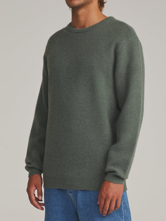 Katin Rivers Sweater in Gray Green, worn by a model, side view