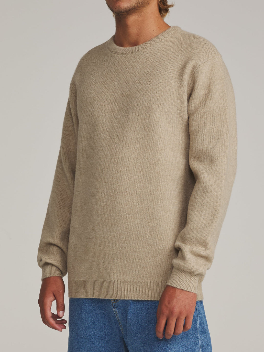 Katin Rivers Sweater in Vintage Khaki, worn by a model, side view