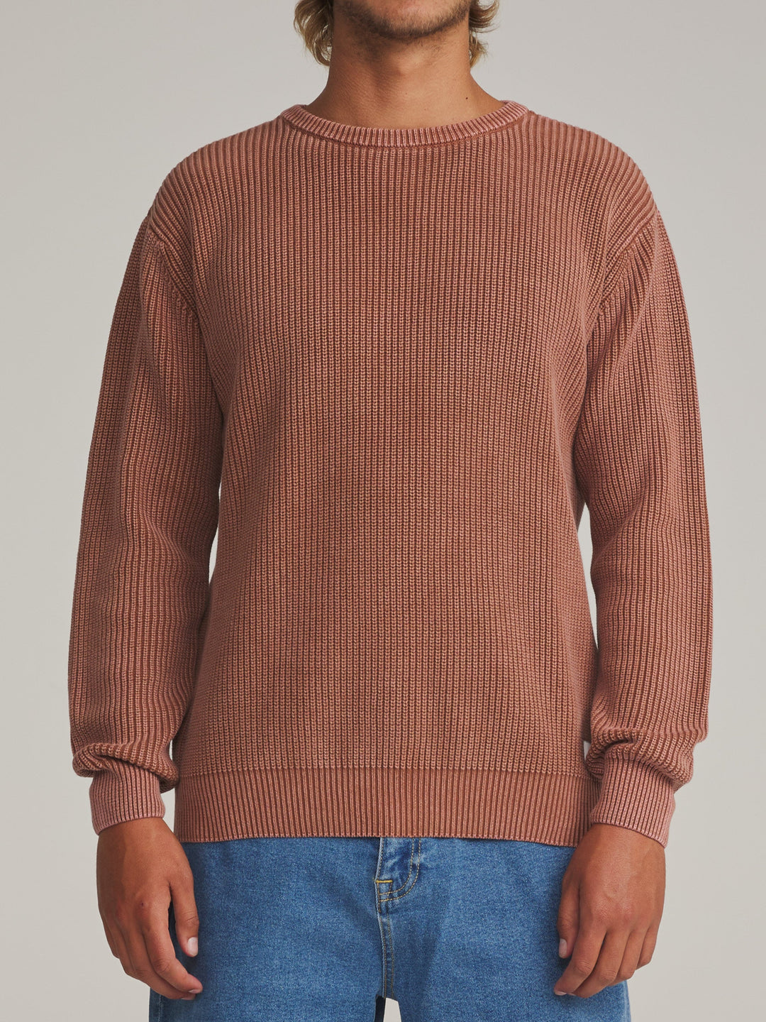 Katin Swell Sweater in Rust, worn by a model, front view